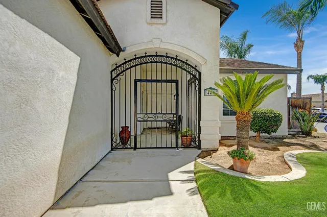 a house view with a garden space