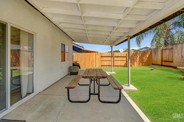 a view of a backyard with a slide