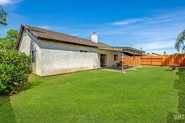 a view of a porch with a yard