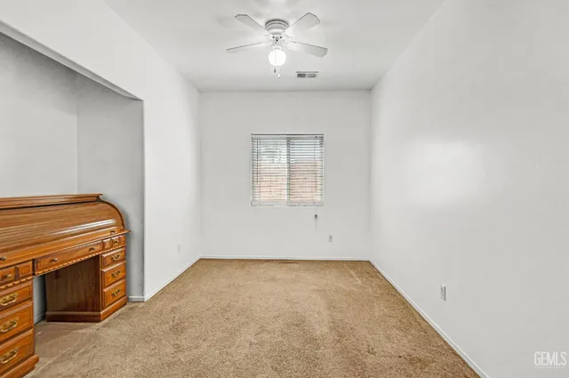 a view of a room with a stove and a window