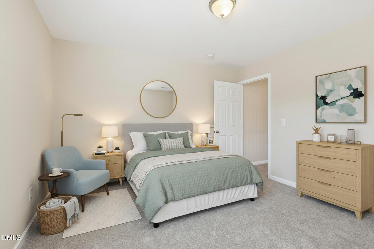 11 Hidden Ridge Court Durham, NC 27707 - Photo 22 of 30 a bedroom with a bed and cabinets