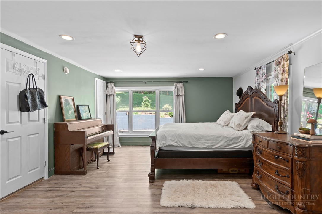 142 Pioneer Road Harmony, NC 28634 - Photo 30 of 49 a bed room with a bed and a window