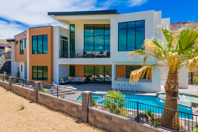 3606 South Cypress Road Hurricane, UT 84737 - Photo 1 of 69 Back of property featuring a patio area, outdoor lounge area, and stucco siding