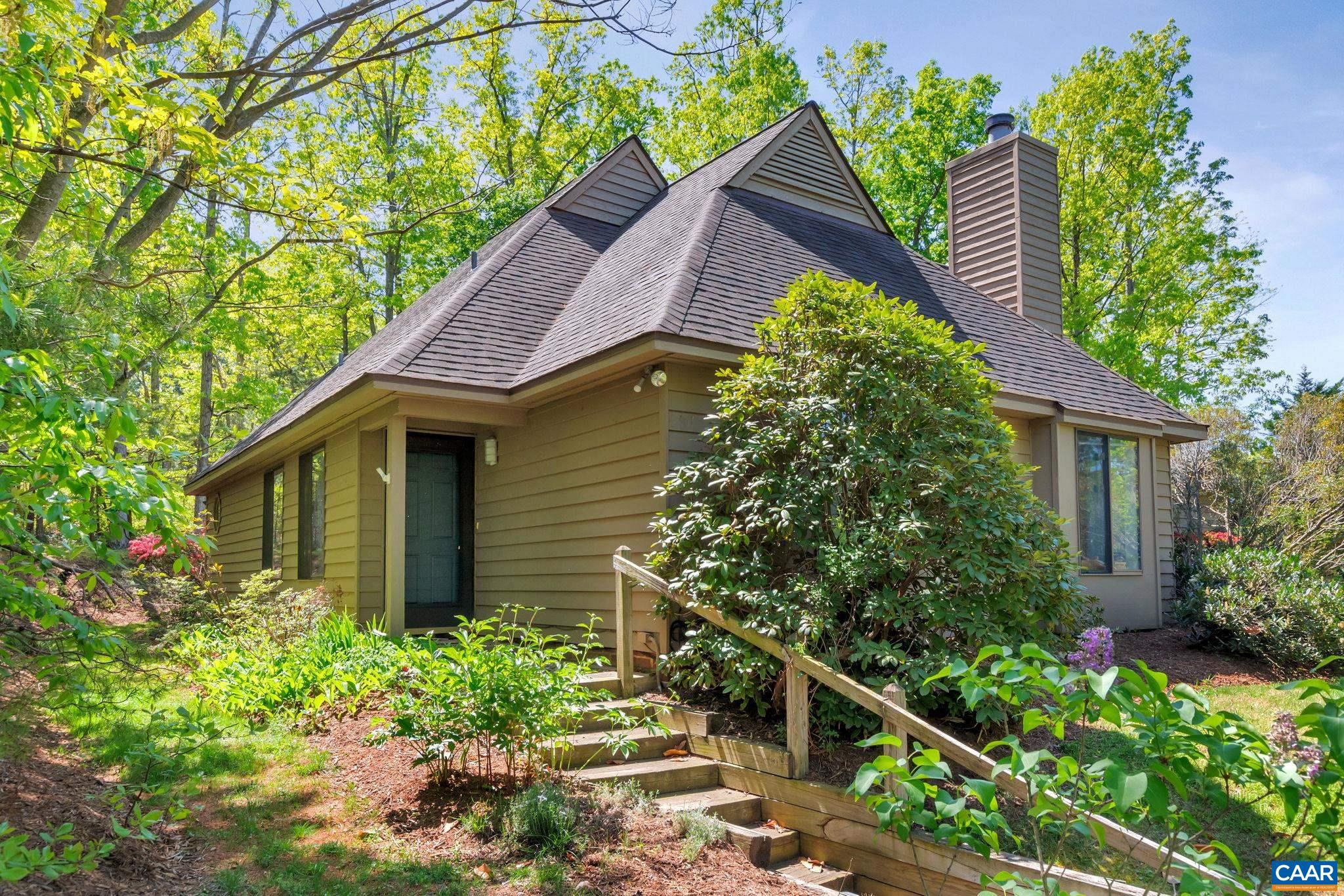 a house with a flower garden