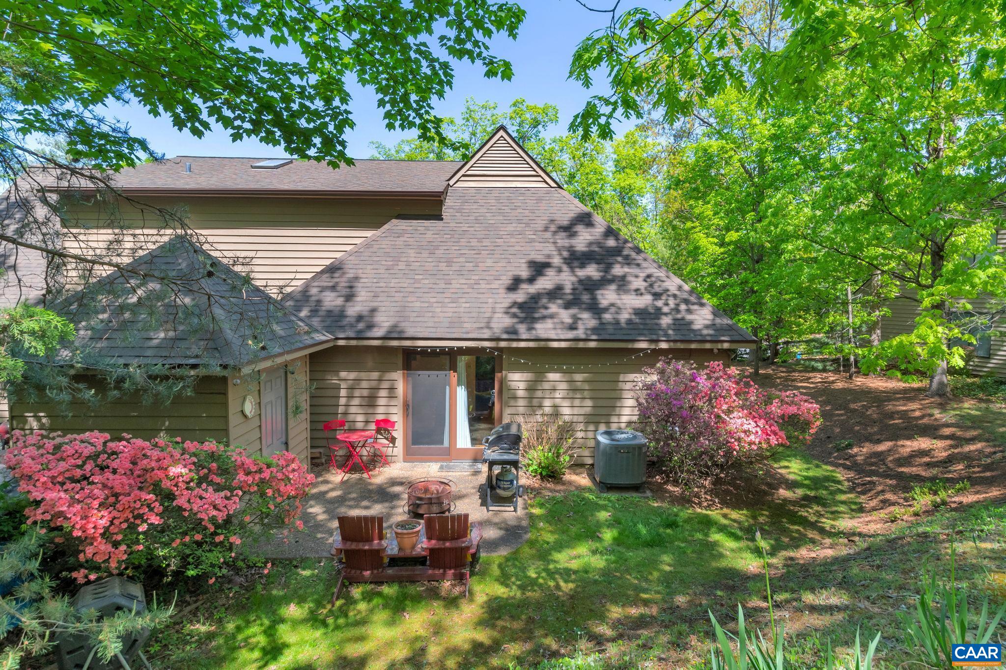 17 Ridgeview Circle Charlottesville, VA 22902 - Photo 3 of 20 a small pool is sitting in the middle of a garden
