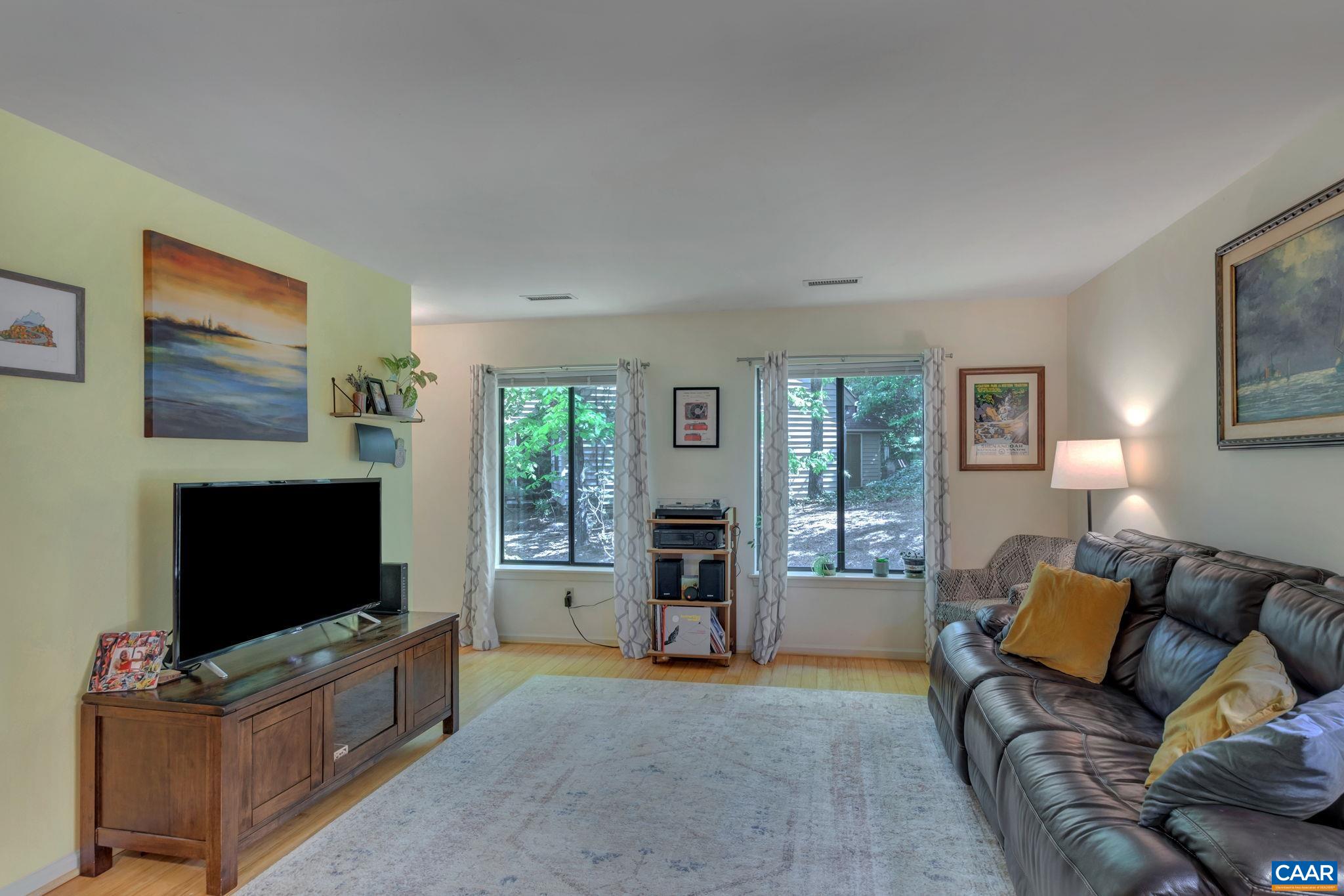17 Ridgeview Circle Charlottesville, VA 22902 - Photo 5 of 20 a living room with furniture and a flat screen tv