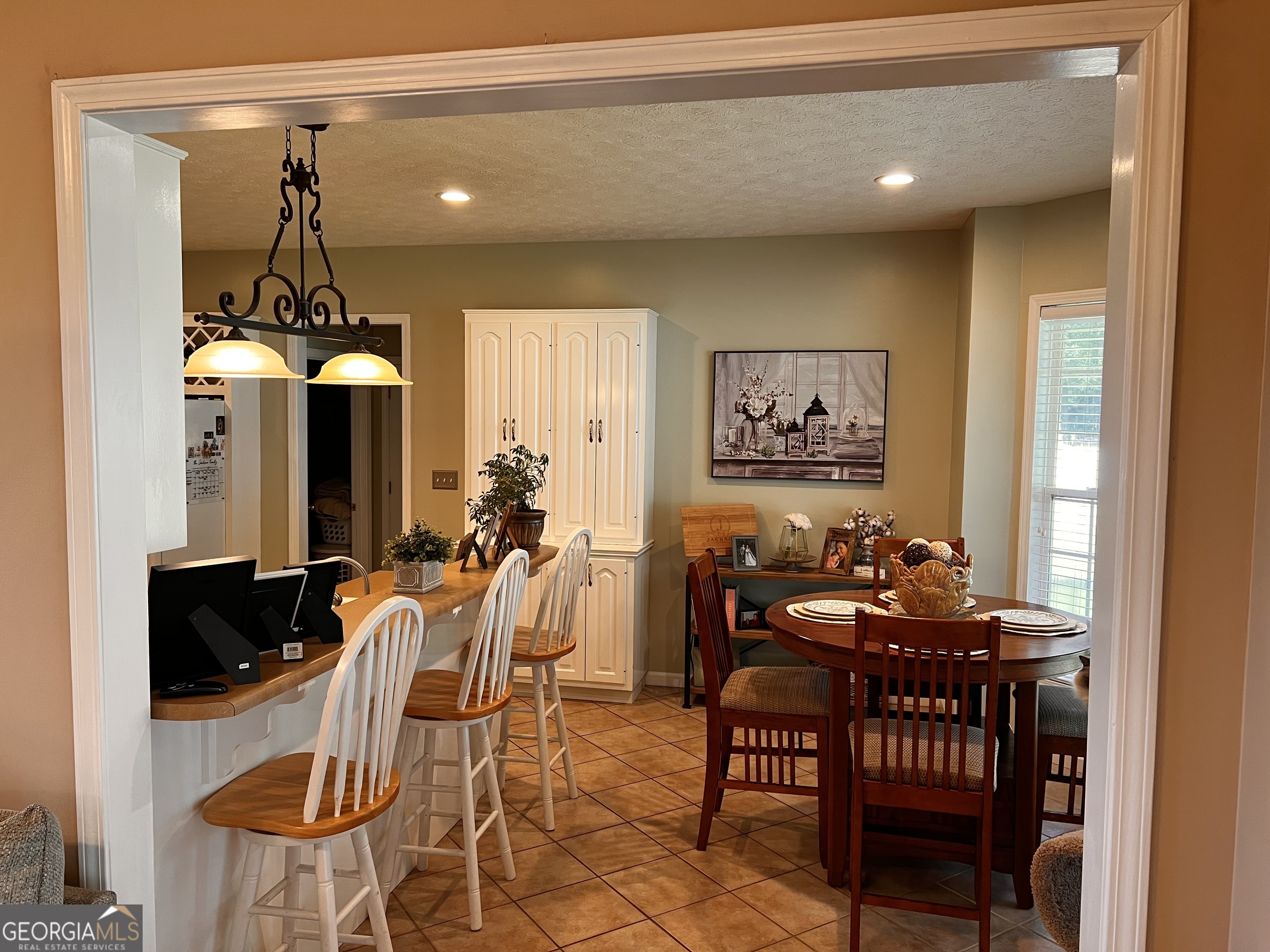 410 Irvin Road Thomaston, GA 30286 - Photo 14 of 42 a dining room with furniture and window
