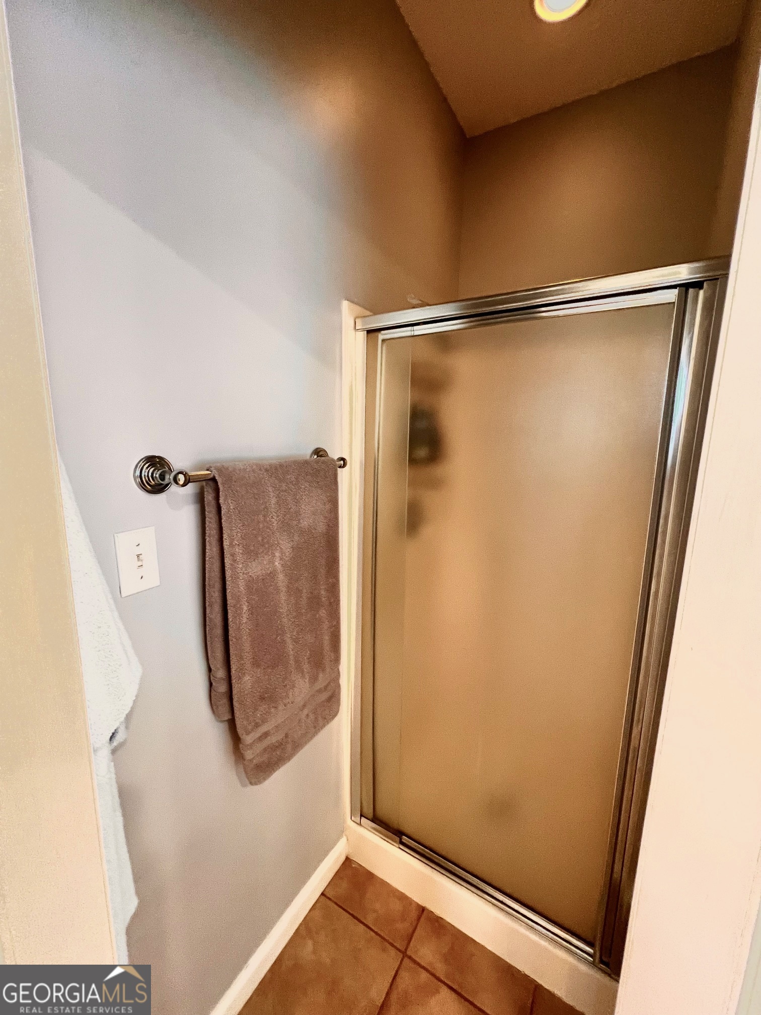 410 Irvin Road Thomaston, GA 30286 - Photo 27 of 42 a bathroom with a shower and a mirror