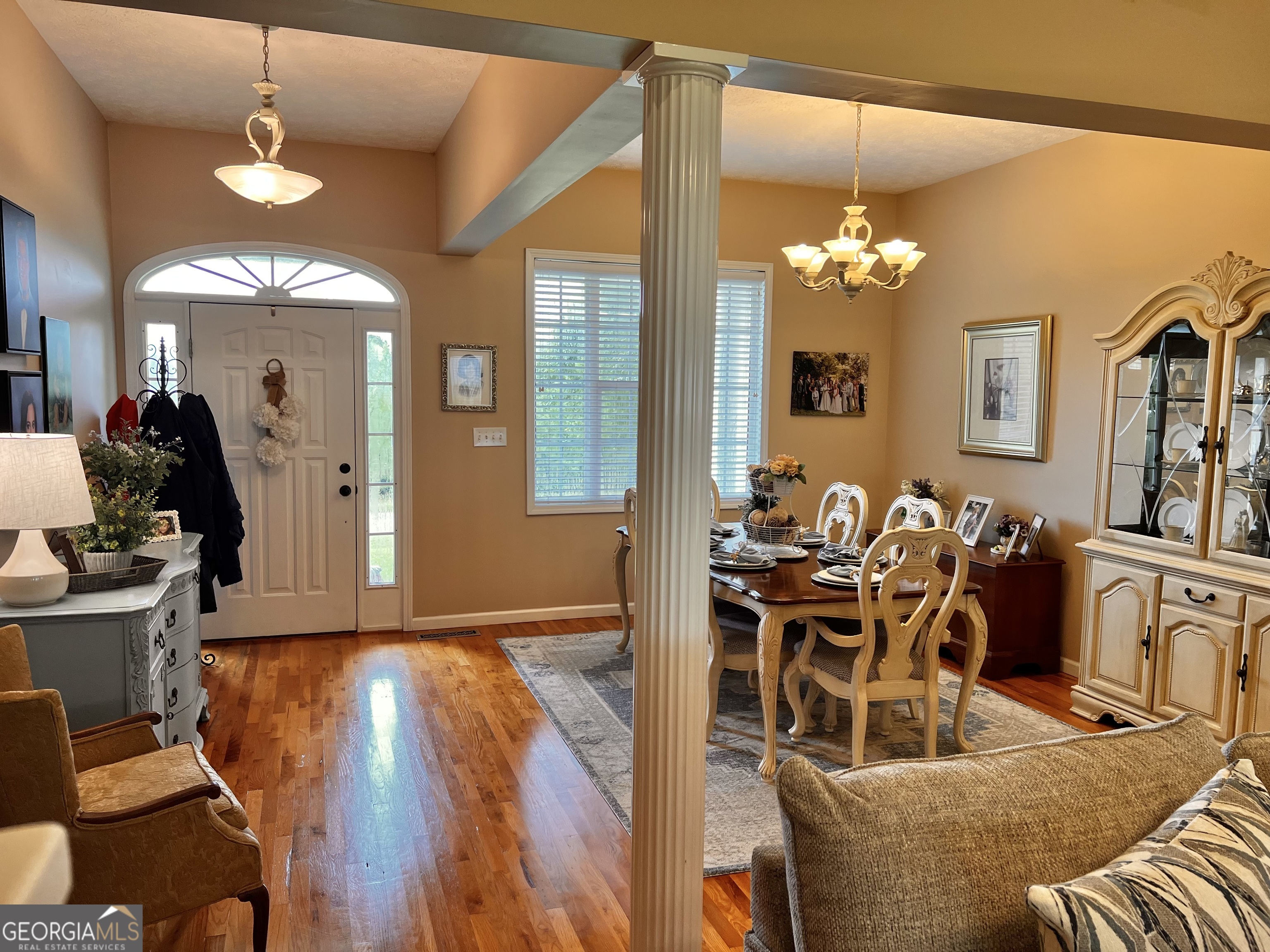 410 Irvin Road Thomaston, GA 30286 - Photo 7 of 42 a view of a dining room with furniture and chandelier