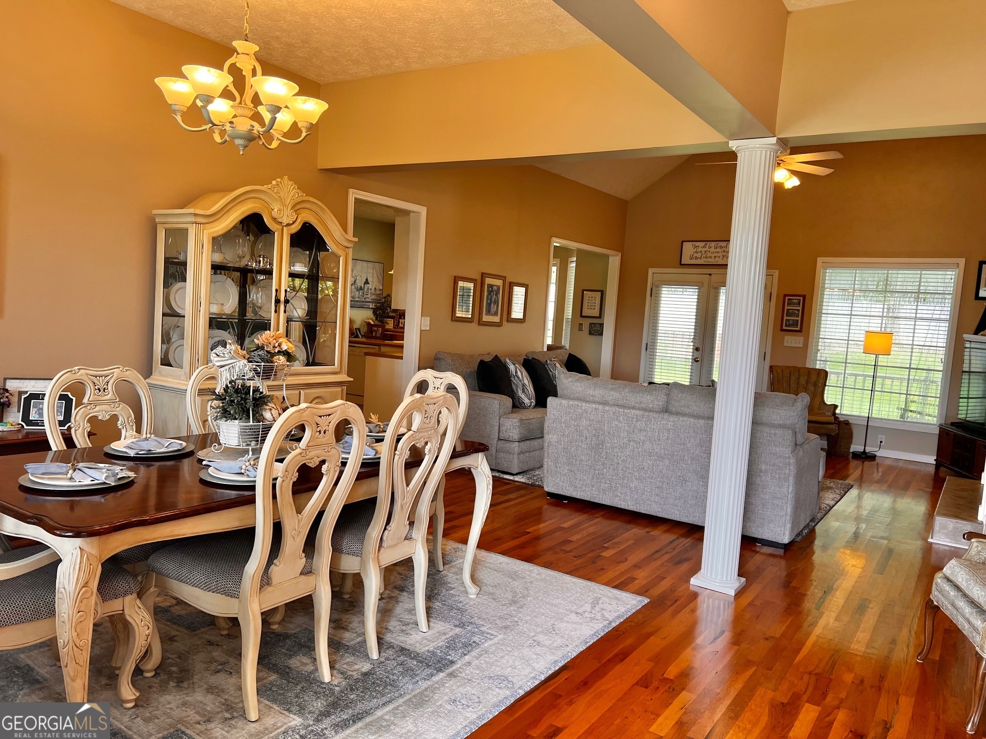 410 Irvin Road Thomaston, GA 30286 - Photo 9 of 42 a view of a dining room with furniture wooden floor and a chandelier