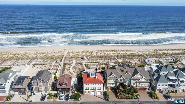 a view of city with ocean
