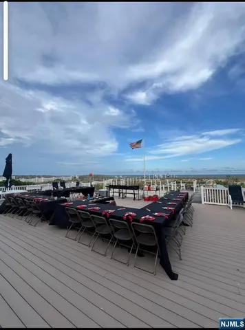 a view of a terrace with sitting area