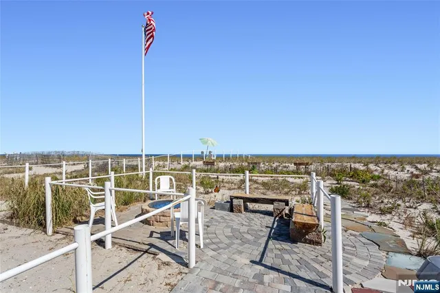 a view of a balcony with an ocean view