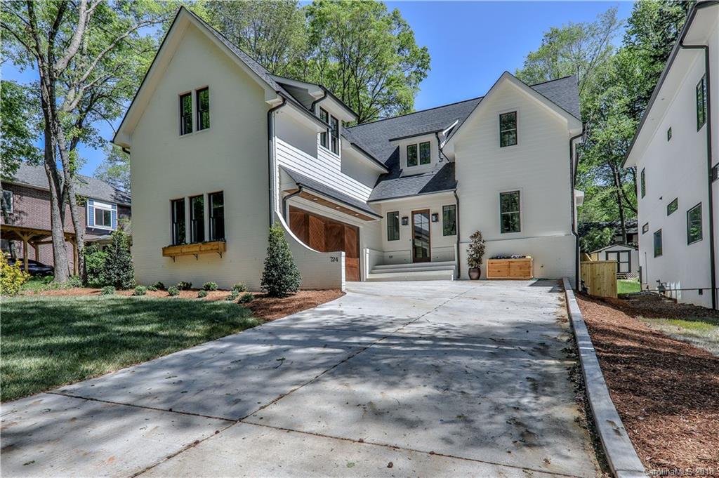 724 Ellsworth Road Charlotte, NC 28211 - Photo 1 of 33 a front view of a house with a yard
