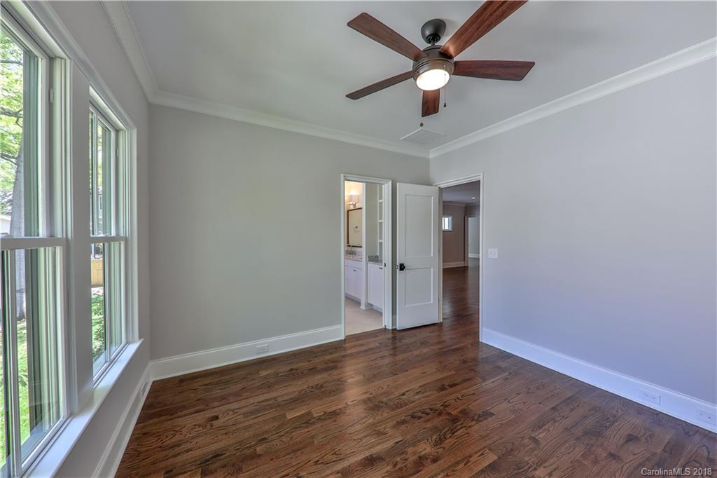 724 Ellsworth Road Charlotte, NC 28211 - Photo 28 of 33 wooden floor in an empty room with a window