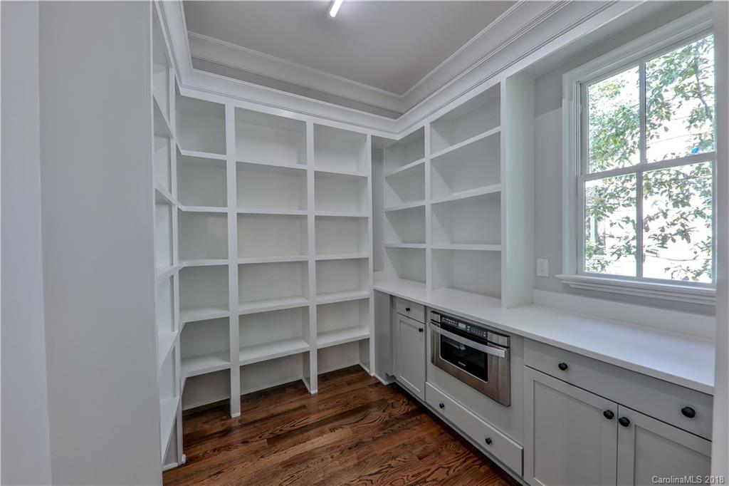 724 Ellsworth Road Charlotte, NC 28211 - Photo 10 of 33 a view with cabinets and a window