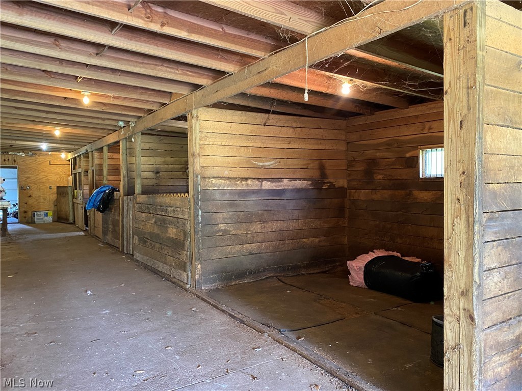 7706 Sanborn Road Ashtabula, OH 44004 - Photo 29 of 35 12-stall horse barn with water, 1/2 concrete floor w/ pads, 1/2 dirt floor.