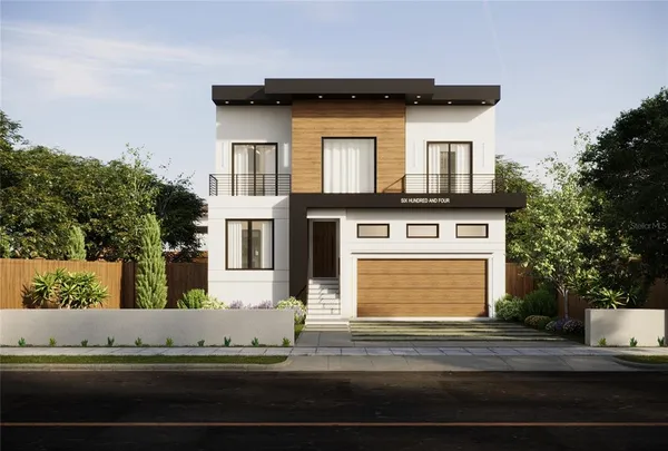 a view of a house with a yard and garage