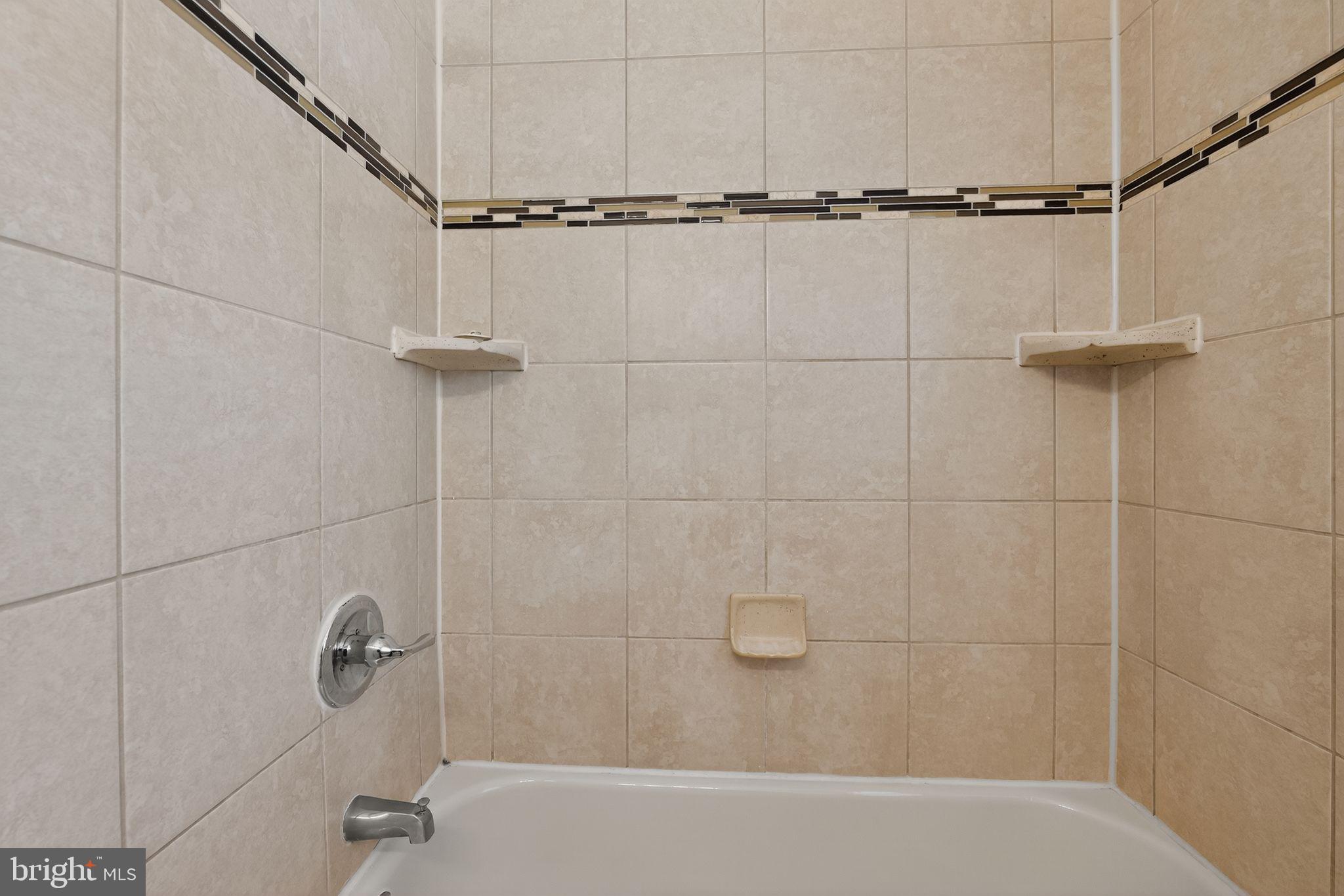 3125 Vulcan Road Dundalk, MD 21222 - Photo 27 of 33 a bathroom with a shower