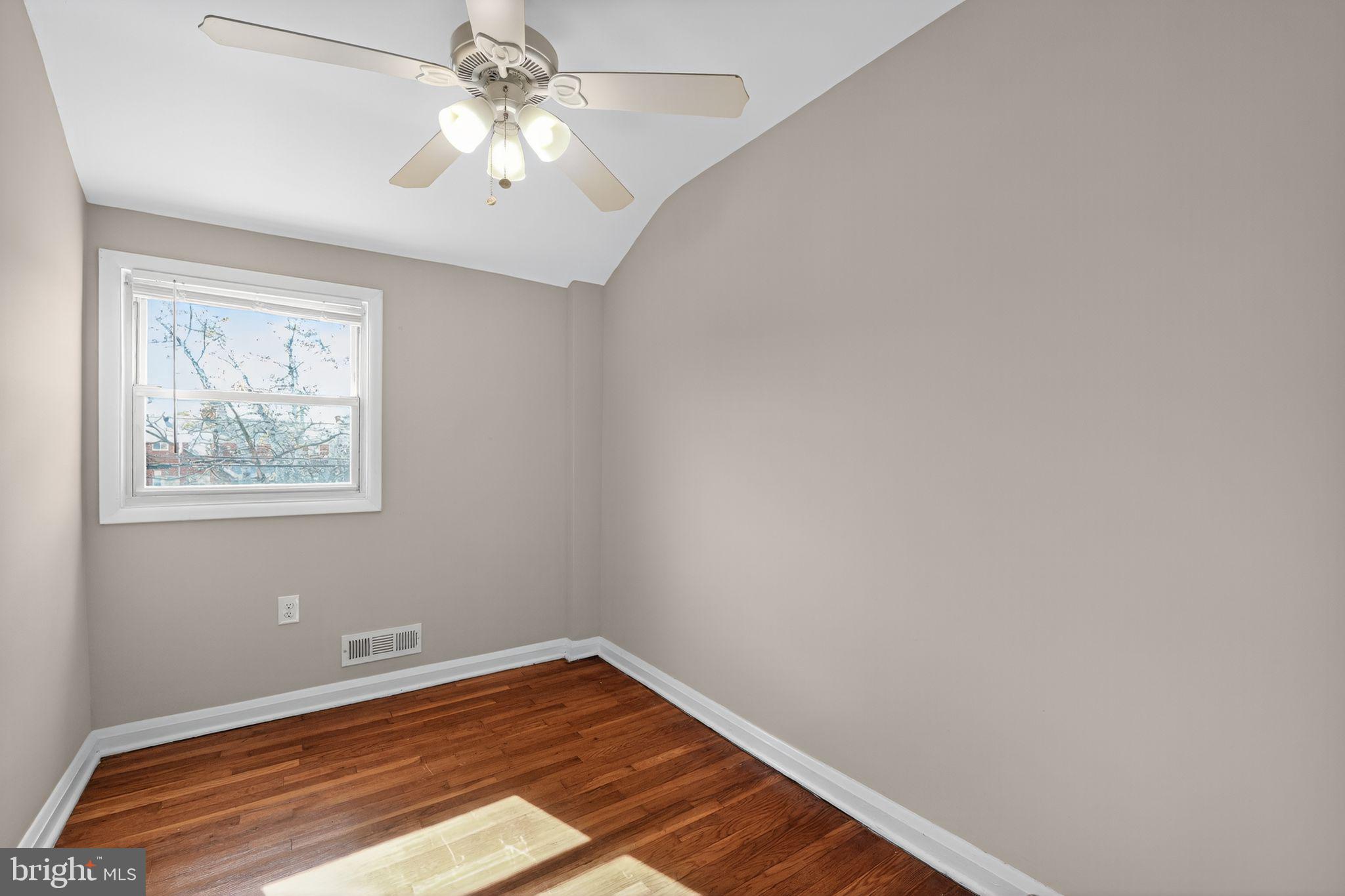 3125 Vulcan Road Dundalk, MD 21222 - Photo 7 of 33 a view of room with window and ceiling fan
