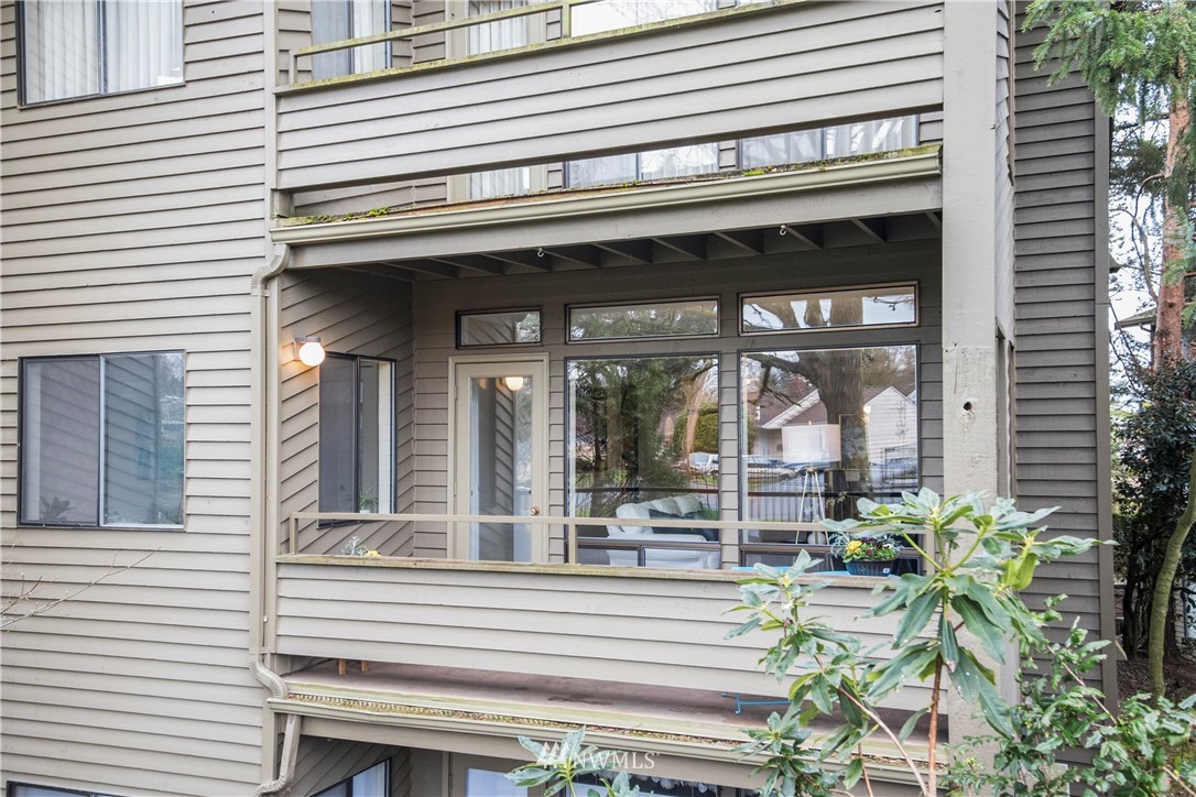 118 Southwest 116th Street, Unit D21 Seattle, WA 98146 - Photo 1 of 17 a view of a entryway door front of a house