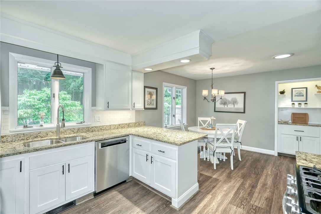 175 Longview Drive Webster, NY 14580 - Photo 17 of 47 beautiful updated kitchen is open to the dining sp
