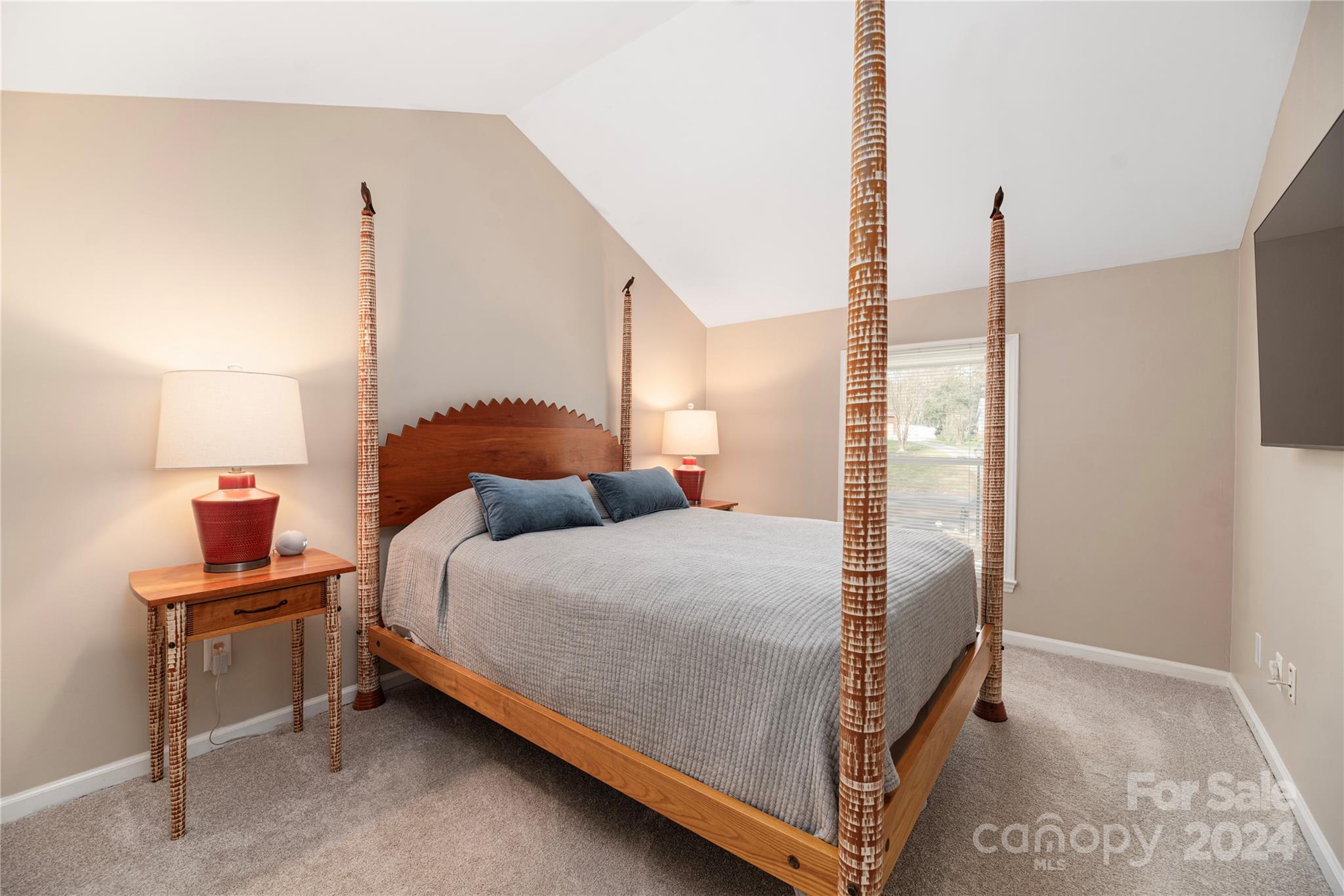 21525 Sandy Cove Road Cornelius, NC 28031 - Photo 21 of 35 a bedroom with a bed and a cabinets