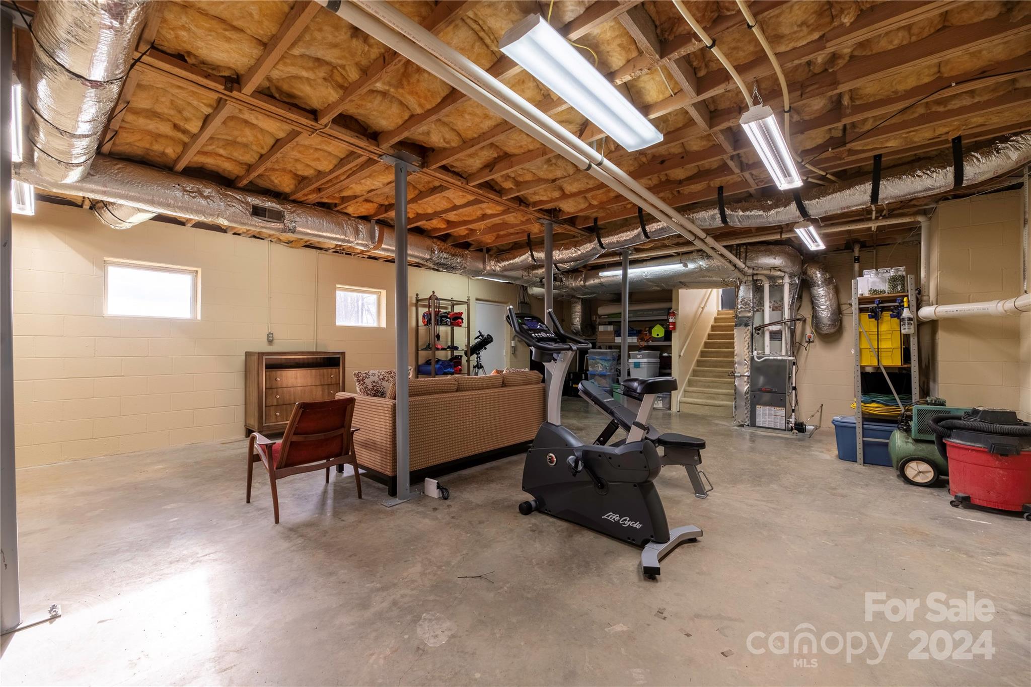 21525 Sandy Cove Road Cornelius, NC 28031 - Photo 27 of 35 a view of a room with gym equipment