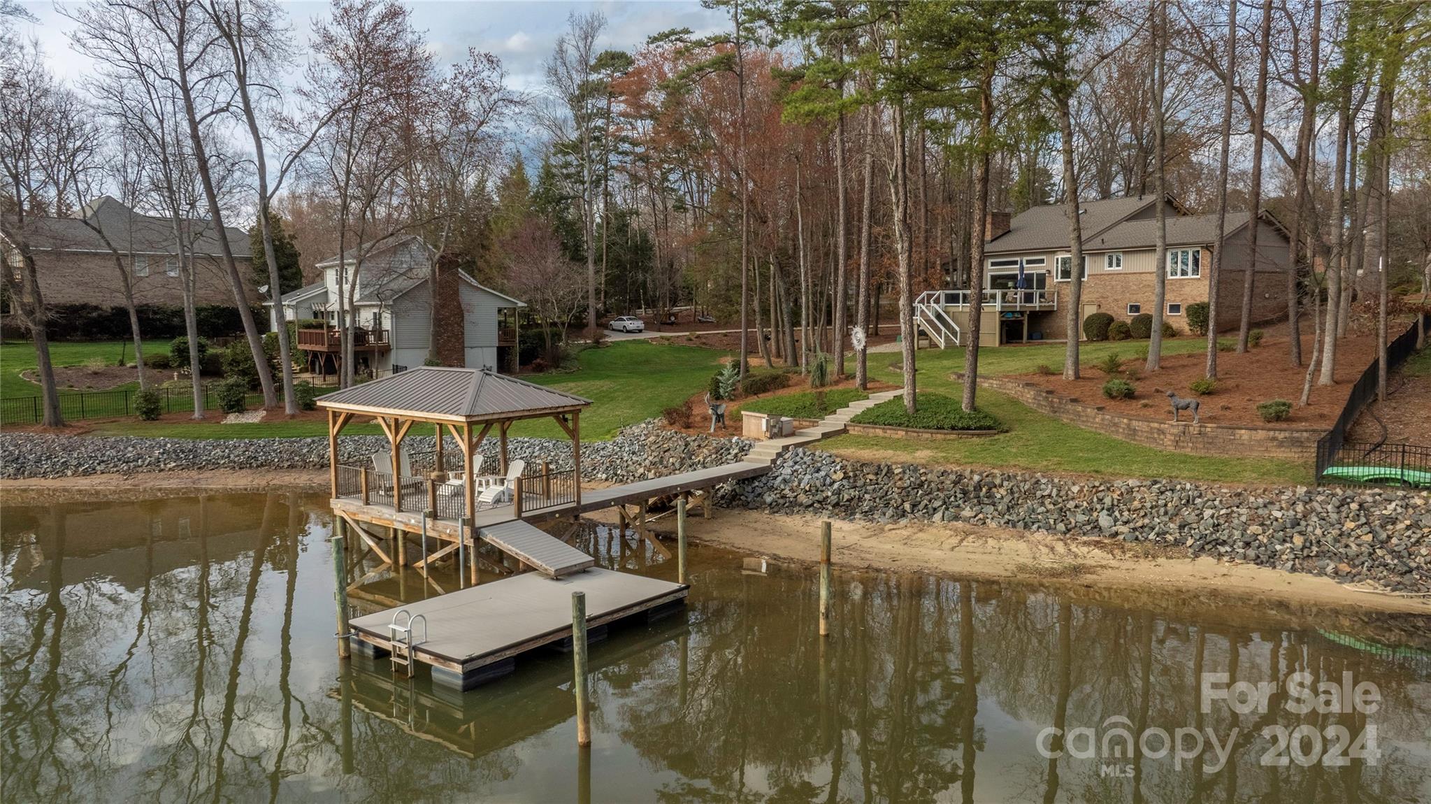 21525 Sandy Cove Road Cornelius, NC 28031 - Photo 31 of 35 a view of a house with backyard and sitting area