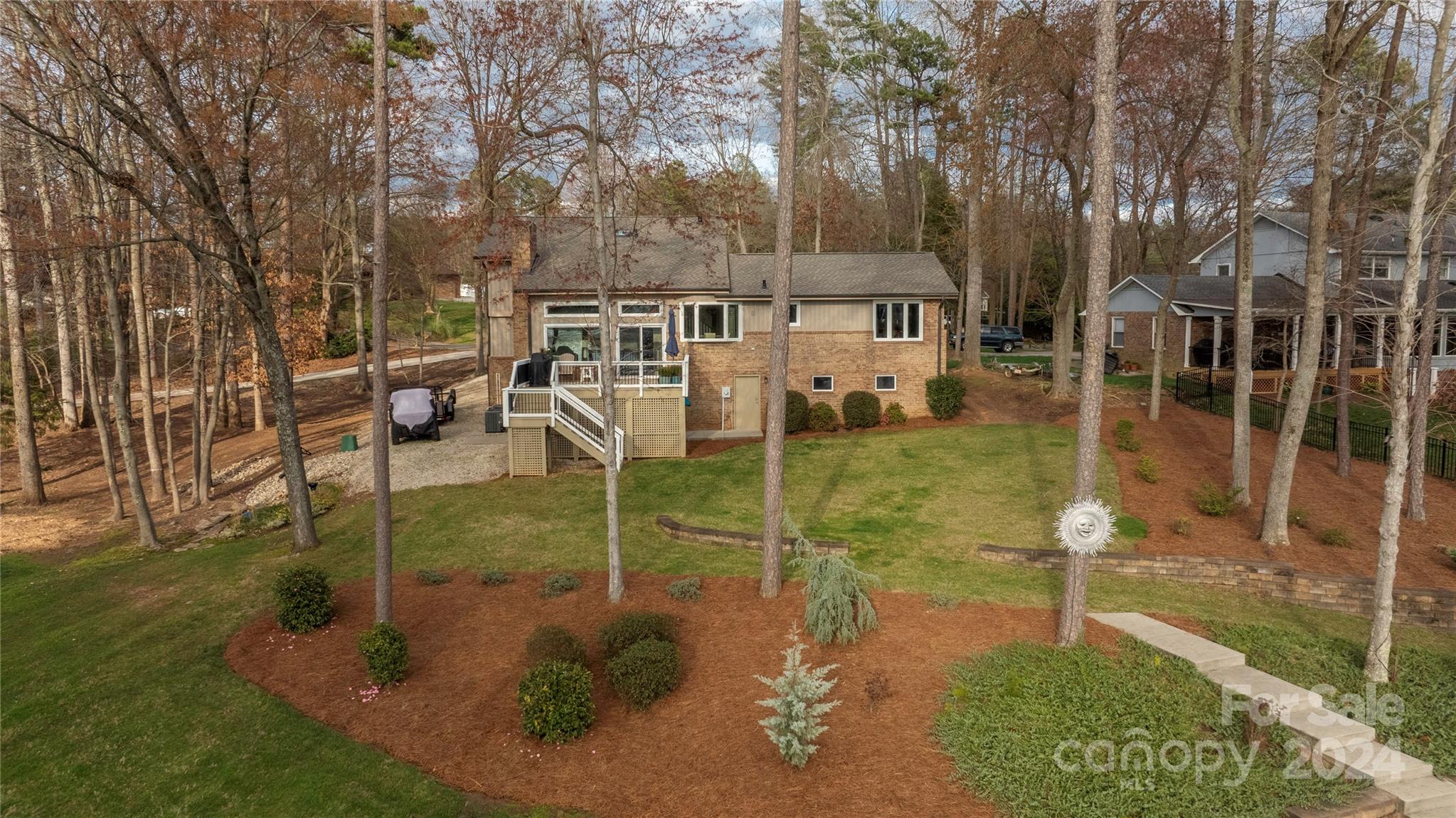 21525 Sandy Cove Road Cornelius, NC 28031 - Photo 32 of 35 a view of a house with backyard