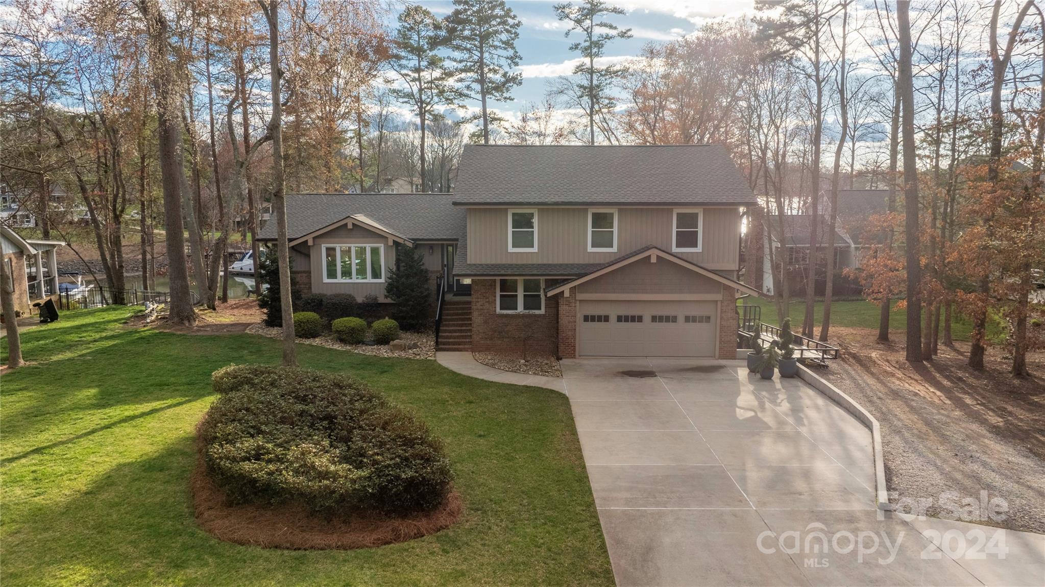 21525 Sandy Cove Road Cornelius, NC 28031 - Photo 35 of 35 a front view of a house with a yard