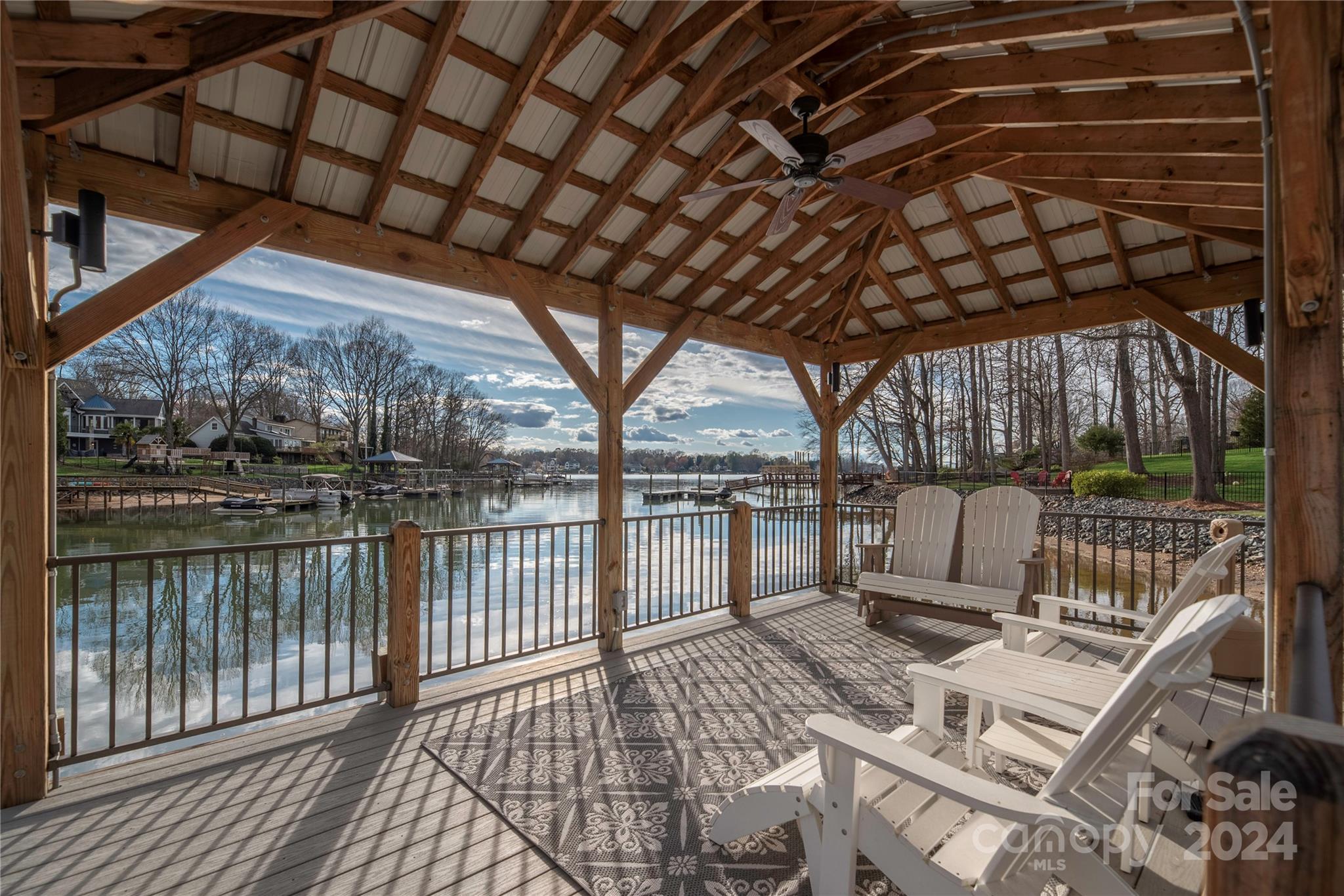 21525 Sandy Cove Road Cornelius, NC 28031 - Photo 5 of 35 a view of a chairs and tables in the balcony