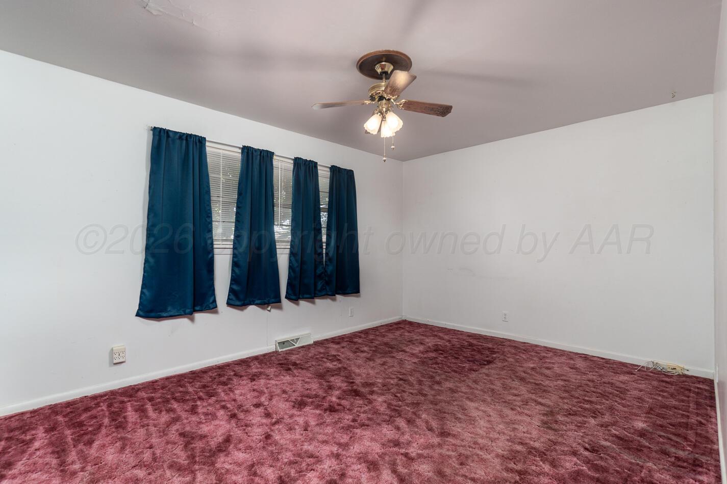 300 Mccarthy Street Borger, TX 79007 - Photo 16 of 31 a view of an empty room with a window