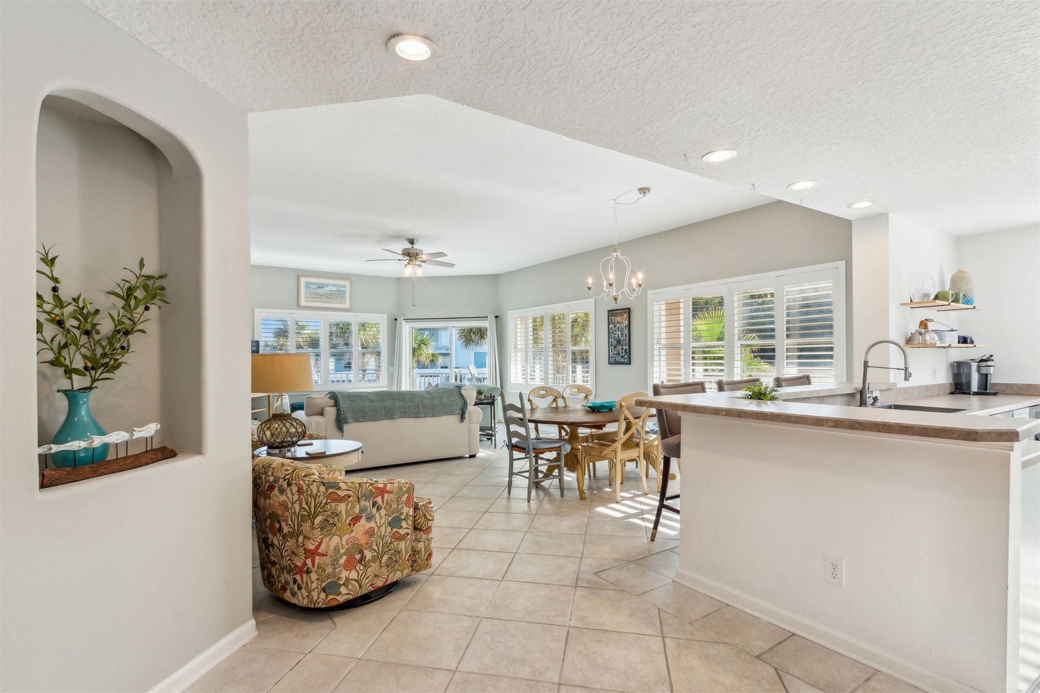 403 Tarpon Avenue, Unit 101 Fernandina Beach, FL 32034 - Photo 5 of 36 a living room with furniture and a large window