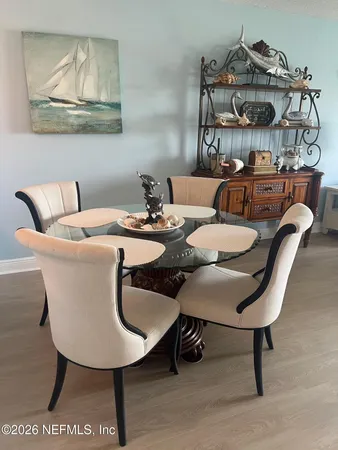 a view of a dining room with furniture