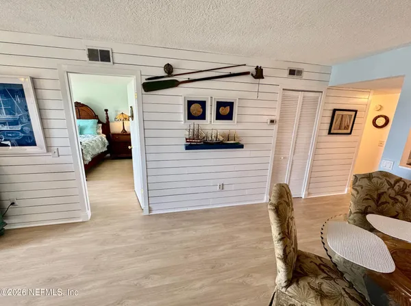 a bedroom with a bed and a cabinets