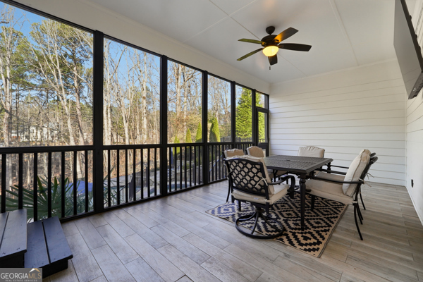 7125 Compton Circle Cumming, GA 30040 - Photo 19 of 40 a view of a dining room with furniture window and wooden floor
