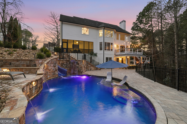 7125 Compton Circle Cumming, GA 30040 - Photo 21 of 40 a view of a house with pool and sitting area