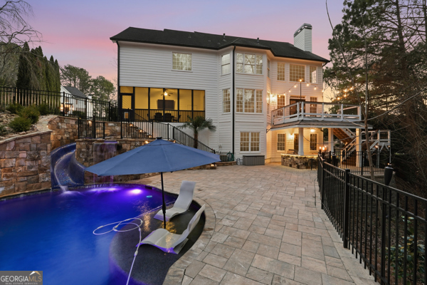 7125 Compton Circle Cumming, GA 30040 - Photo 22 of 40 a view of a house with backyard and furniture