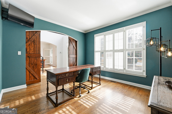7125 Compton Circle Cumming, GA 30040 - Photo 3 of 40 a workspace with furniture and a window