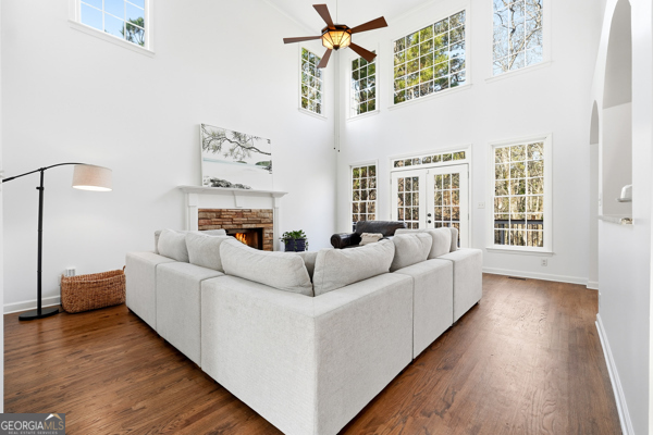 7125 Compton Circle Cumming, GA 30040 - Photo 4 of 40 a living room with furniture and a fireplace