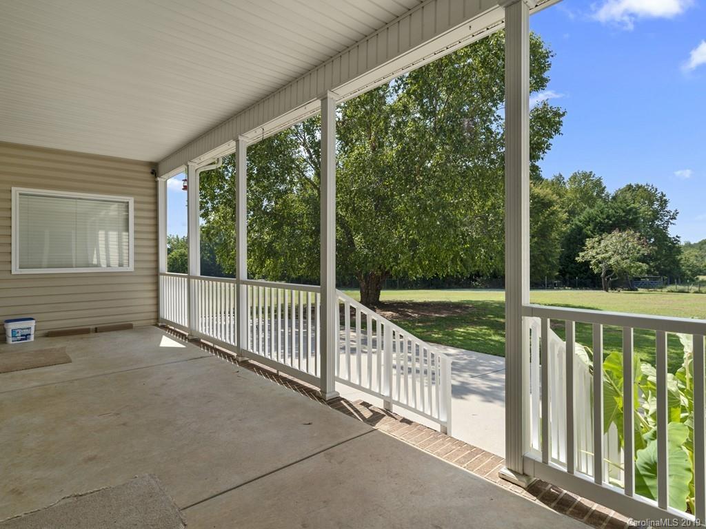 140 Springlake Road York, SC 29745 - Photo 15 of 24 a view of a room with porch and wooden floor