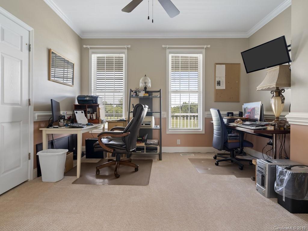 140 Springlake Road York, SC 29745 - Photo 16 of 24 a view of a workspace with furniture and a window