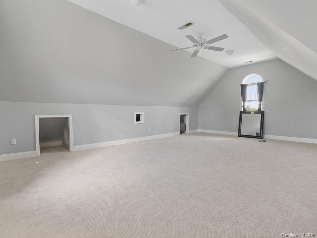 140 Springlake Road York, SC 29745 - Photo 17 of 24 a view of an empty room with a ceiling fan and window