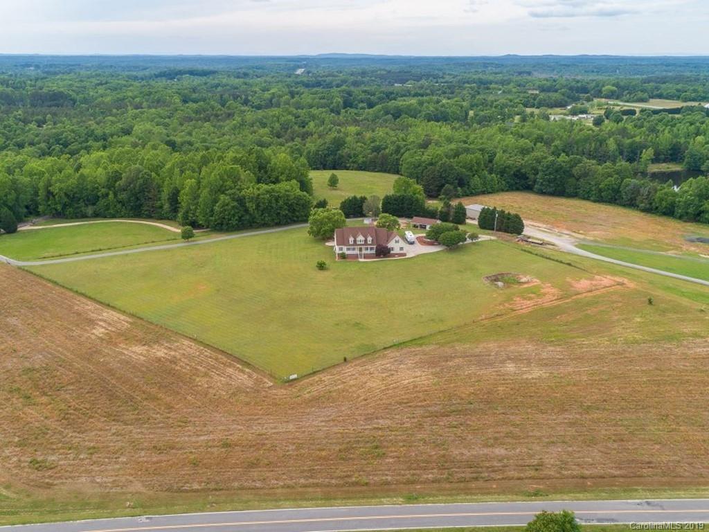 140 Springlake Road York, SC 29745 - Photo 23 of 24 a view of a big yard with large trees