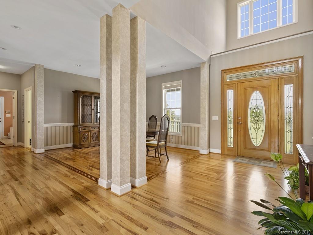 140 Springlake Road York, SC 29745 - Photo 6 of 24 a view of a hallway with wooden floor