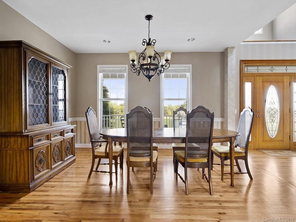 140 Springlake Road York, SC 29745 - Photo 7 of 24 a view of a dining room with furniture window and wooden floor