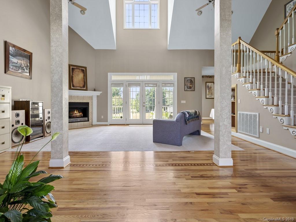 140 Springlake Road York, SC 29745 - Photo 8 of 24 a living room with furniture wooden floor and a fireplace