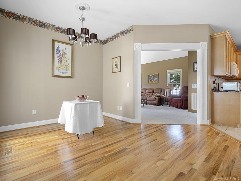 140 Springlake Road York, SC 29745 - Photo 10 of 24 a view of a room with wooden floor and windows