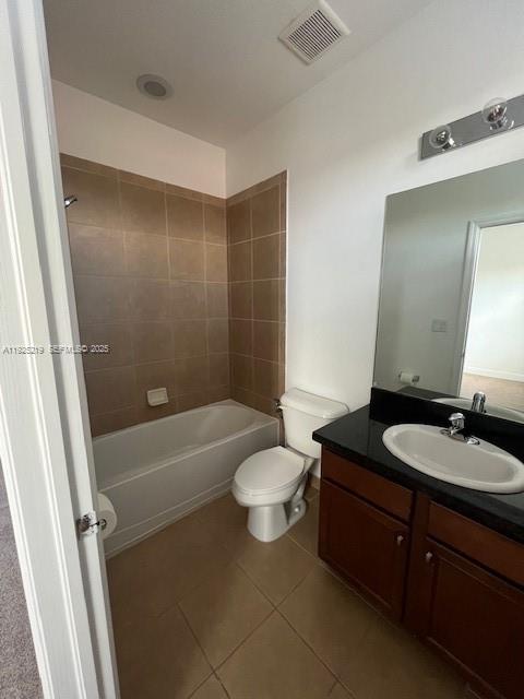 Cobblestone Pembroke Pines, FL 33027 - Photo 13 of 16 a bathroom with a sink a toilet and shower